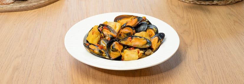 Guiso de mejillones y merluza