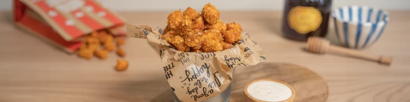 Cotufas de salmón con salsa de yogur y miel