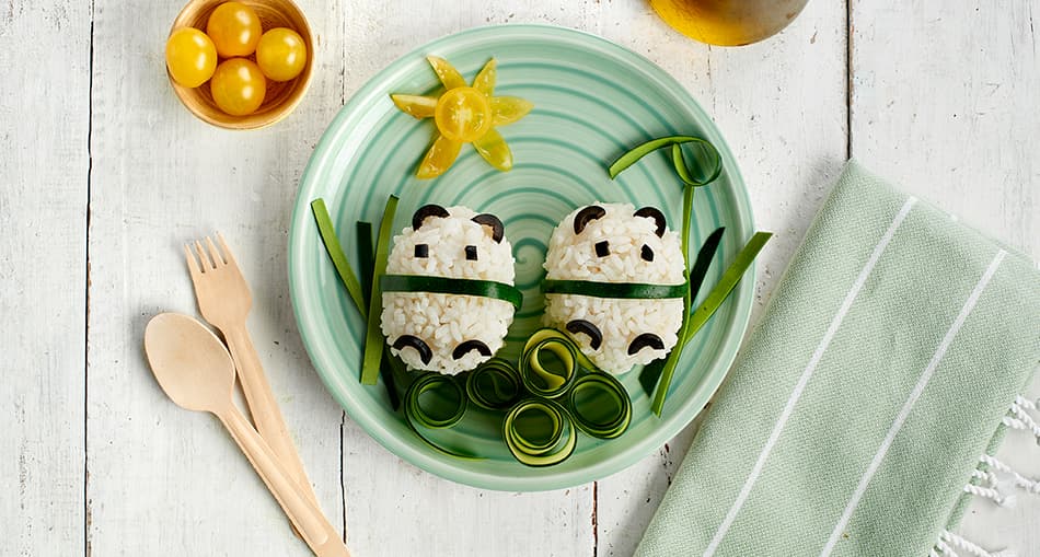 Arroz con verduras con forma de pandas