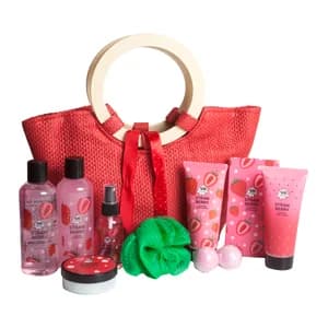 GIRL POWER Bolso de rafia rosa con productos para el cuidado y la higiene personal.