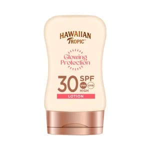 HAWAIIAN TROPICA Glowing protection Loción solar protectora, resistente al agua y con FPS 30 (medio) 100 ml.