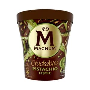 MAGNUM Crackables Tarrina de helado de pistacho con salsa de pistacho cubierto de chocolate con leche 440 ml.
